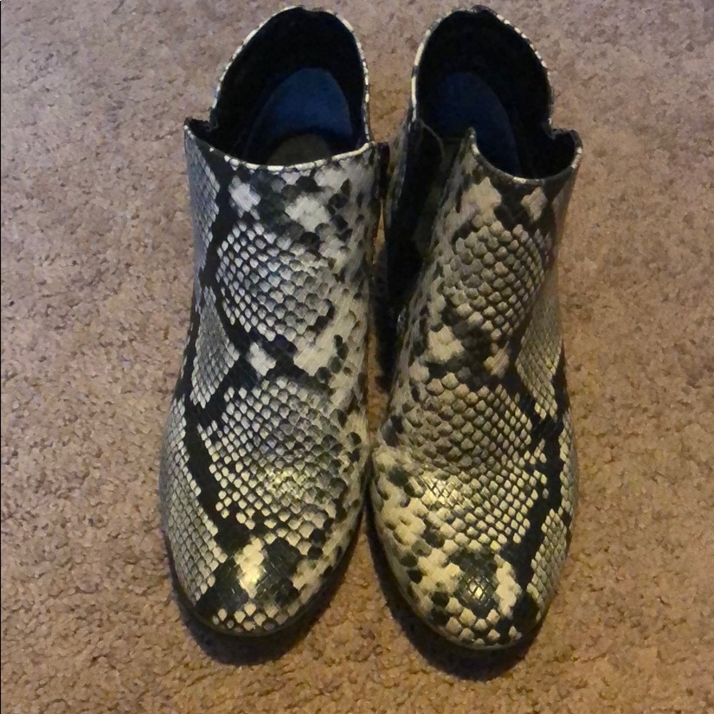 Snake skin ankle booties.